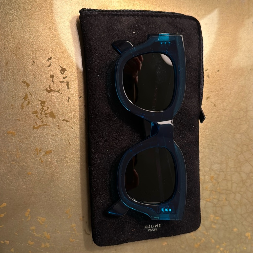 Never worn, Celine blue/green sunglasses with case.